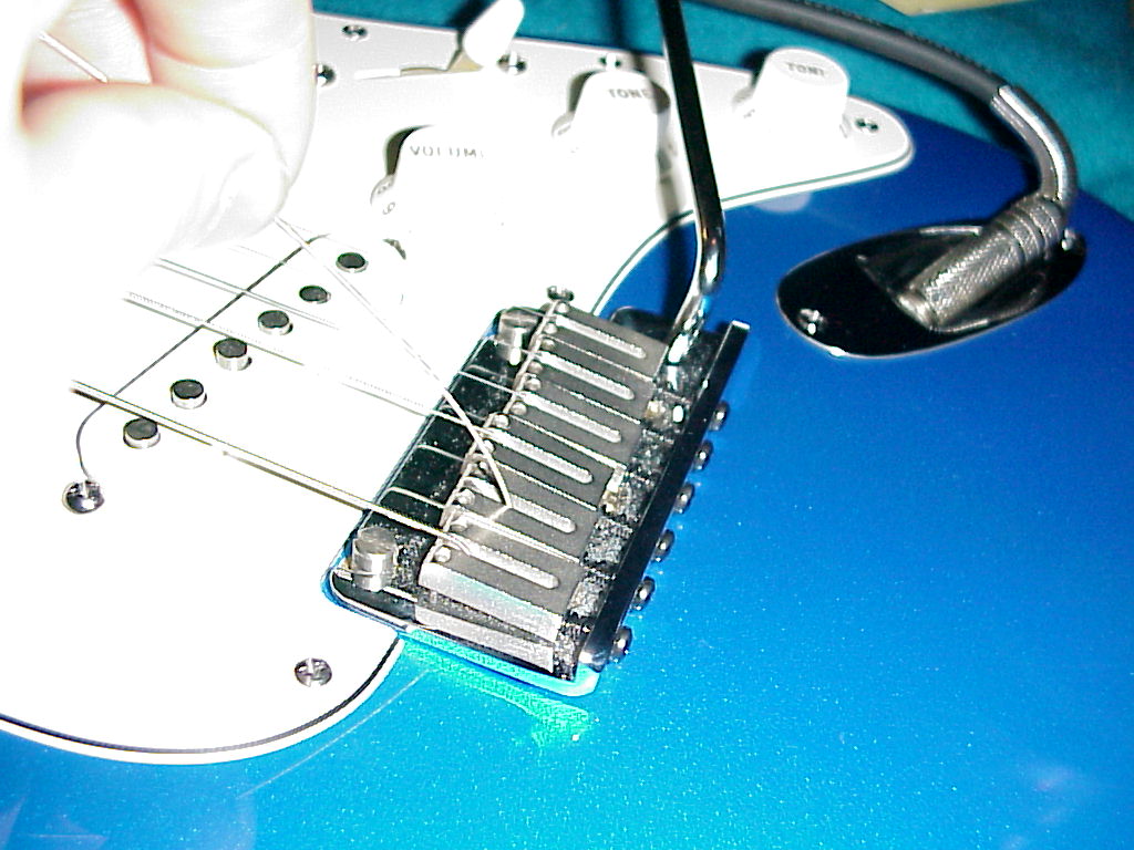 restringing a guitar